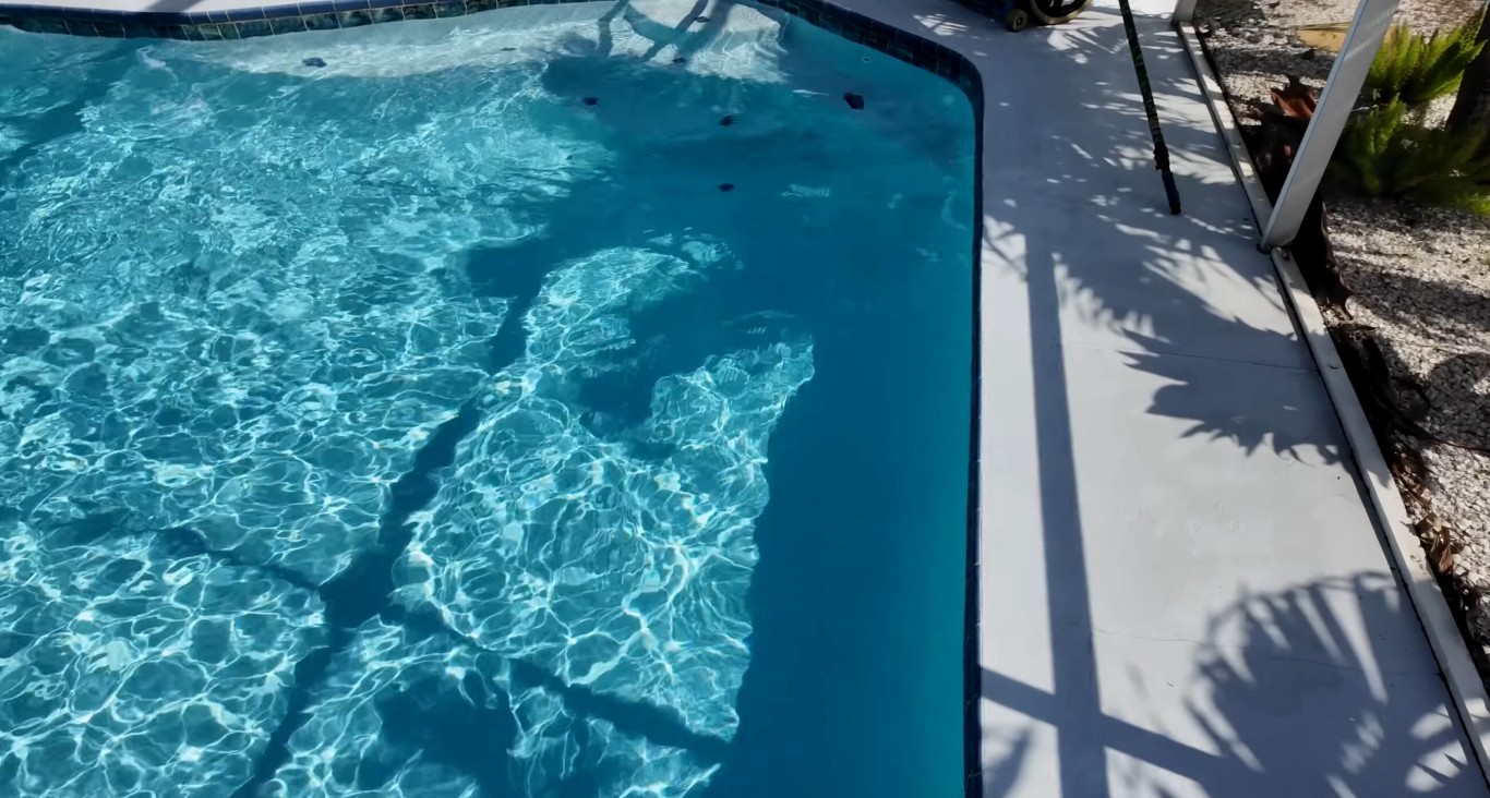 Crystal clear pool water maintained by professional pool cleaning service in Paramount, CA