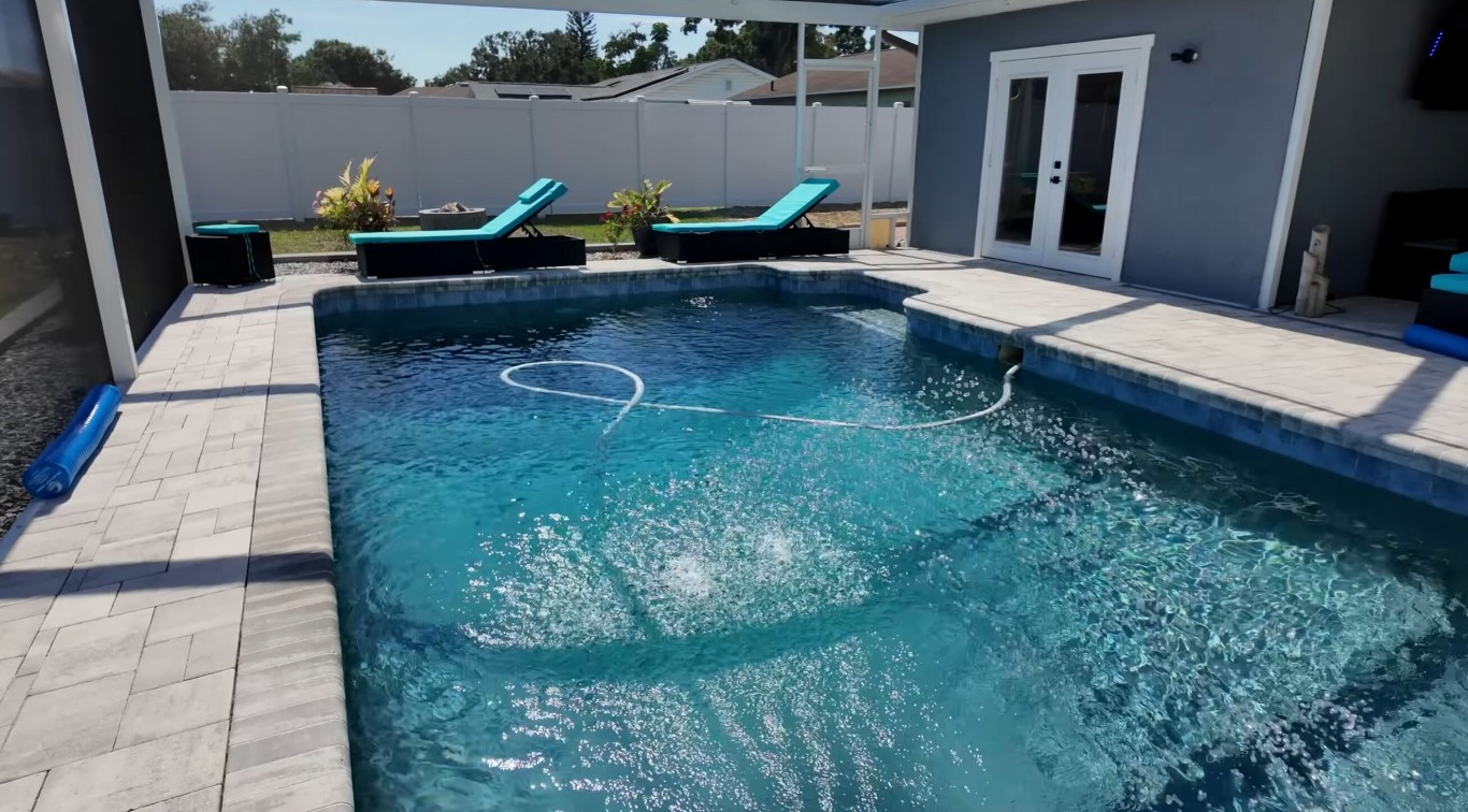 Clean, modern pool after professional green pool treatment and algae removal in Paramount, CA
